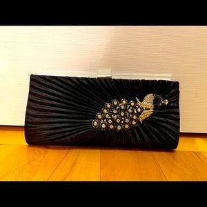Clutch in satin with Swan crystal